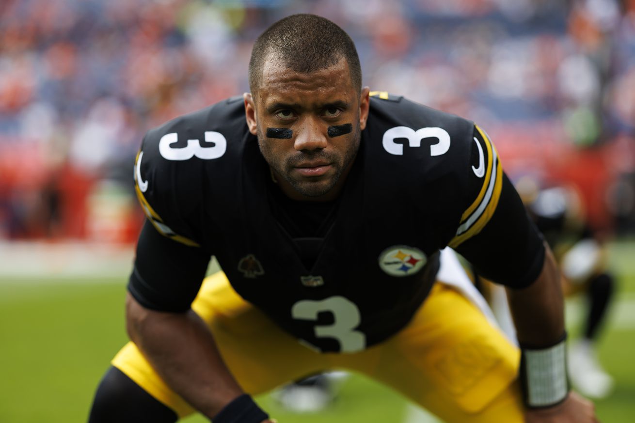 Quarterback Russell Wilson #3 of the Pittsburgh Steelers stretches prior to an NFL football game against the Denver Broncos, at Empower Field at Mile High on September 15, 2024 in Denver, Colorado