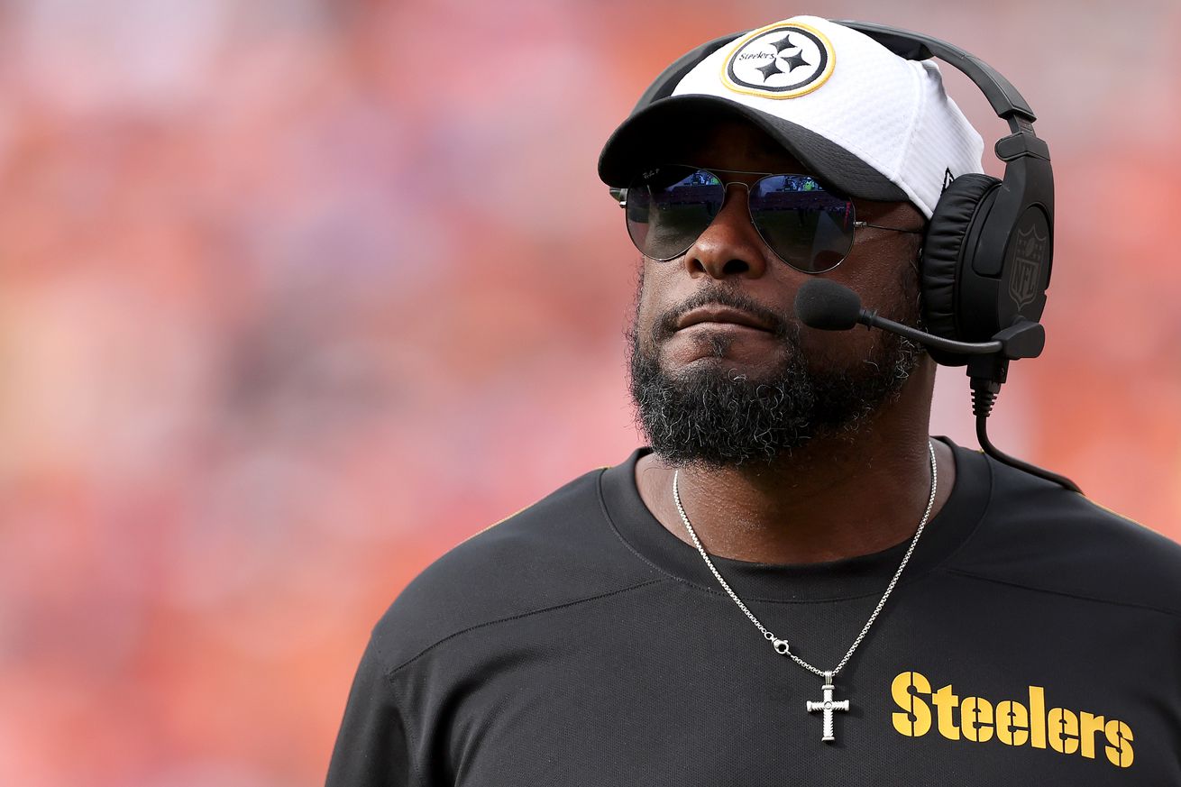 Head coach Mike Tomlin of the Pittsburgh Steelers watches as his team plays the Denver Broncos in the second quarter at Empower Field At Mile High on September 15, 2024 in Denver, Colorado.