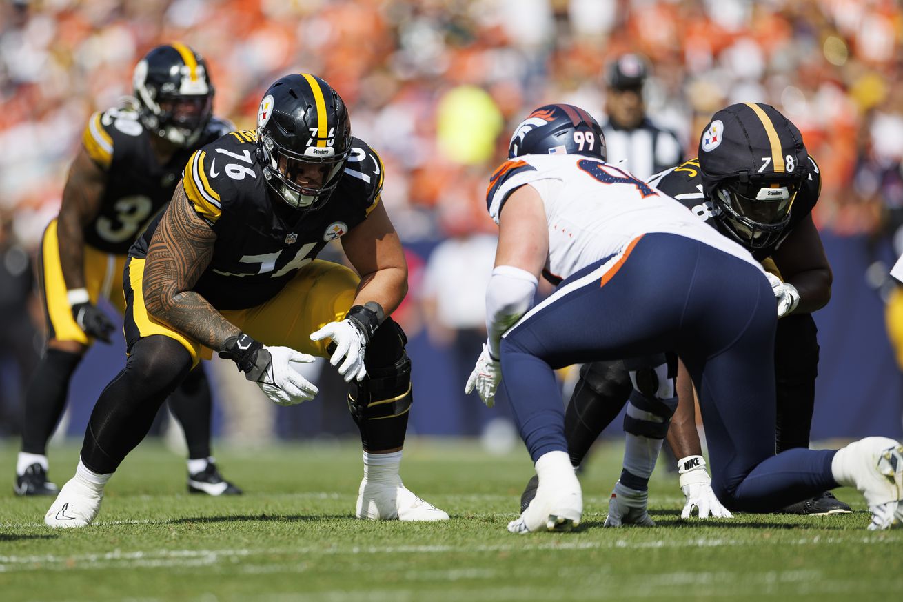 Offensive tackle Troy Fautanu #76 of the Pittsburgh Steelers gets set during the first quarter of an NFL football game against the Denver Broncos, at Empower Field at Mile High on September 15, 2024 in Denver, Colorado.