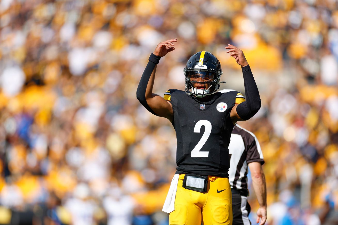 Justin Fields #2 of the Pittsburgh Steelers gestures to the crowd in the fourth quarter during a game against the Los Angeles Chargers at Acrisure Stadium on September 22, 2024 in Pittsburgh, Pennsylvania.