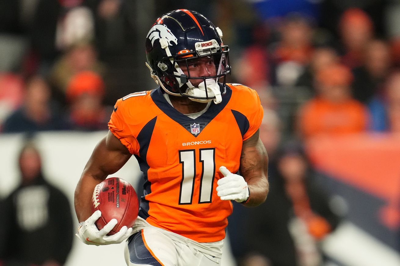 Diontae Spencer #11 of the Denver Broncos runs the ball against the Cincinnati Bengals during an NFL game at Empower Field At Mile High on December 19, 2021 in Denver, Colorado.