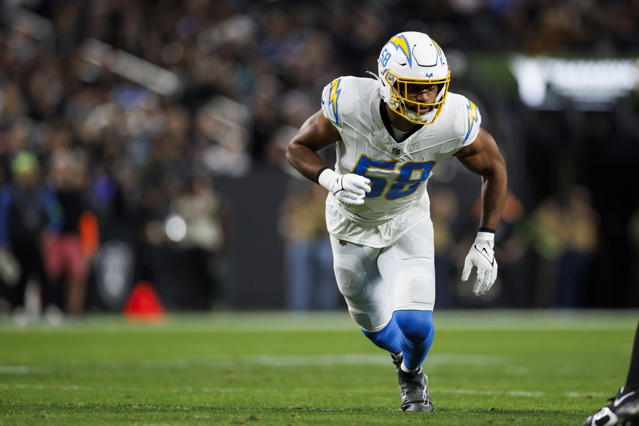 Justin Hollins #58 of the Los Angeles Chargers runs around the edge during an NFL football game against the Las Vegas Raiders at Allegiant Stadium on December 14, 2023 in Las Vegas, Nevada.