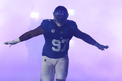 Dexter Lawrence II #97 of the New York Giants runs onto the field prior to an NFL game against the Cincinnati Bengals at MetLife Stadium on October 13, 2024 in East Rutherford, New Jersey.