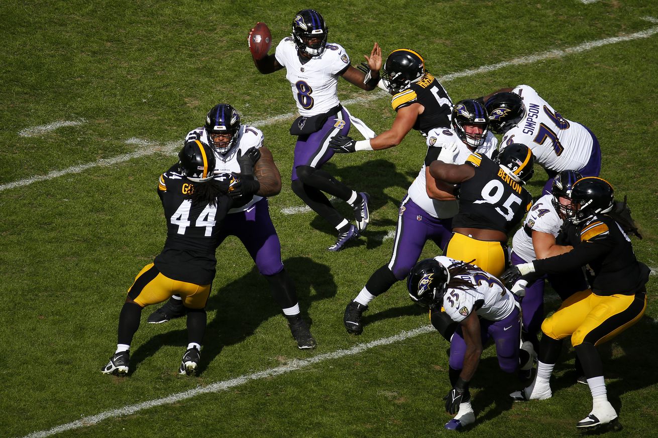 Alex Highsmith #56 of the Pittsburgh Steelers sacks Lamar Jackson #8 of the Baltimore Ravens during the third quarter at Acrisure Stadium on October 08, 2023 in Pittsburgh, Pennsylvania.