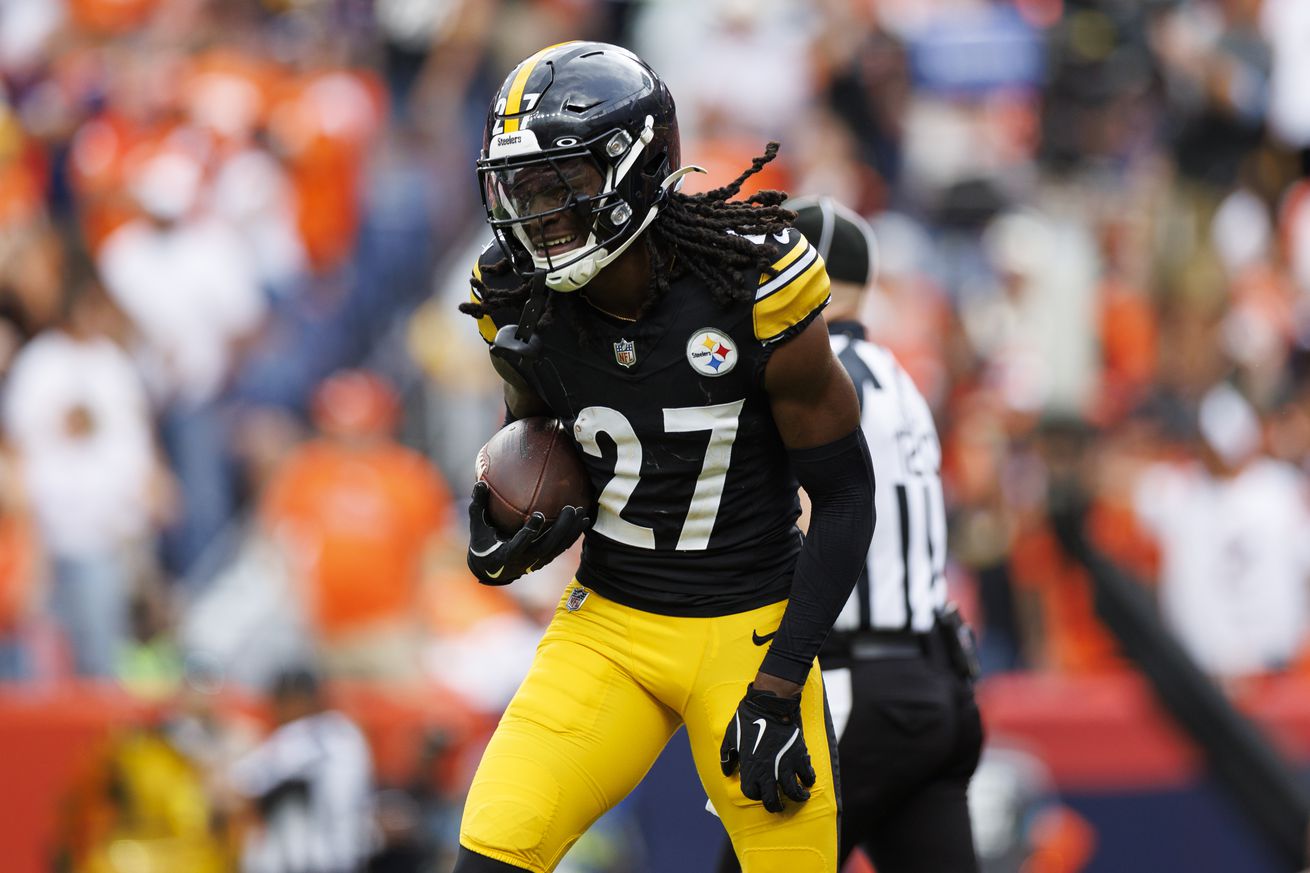 Cornerback Cory Trice Jr. #27 of the Pittsburgh Steelers celebrates after securing an interception during the third quarter of an NFL football game against the Denver Broncos, at Empower Field at Mile High on September 15, 2024 in Denver, Colorado.