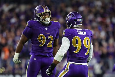 Nnamdi Madubuike #92 of the Baltimore Ravens celebrates with Odafe Oweh #99 after a play against the Cincinnati Bengals during the first half at M&amp;T Bank Stadium on November 7, 2024 in Baltimore, Maryland.