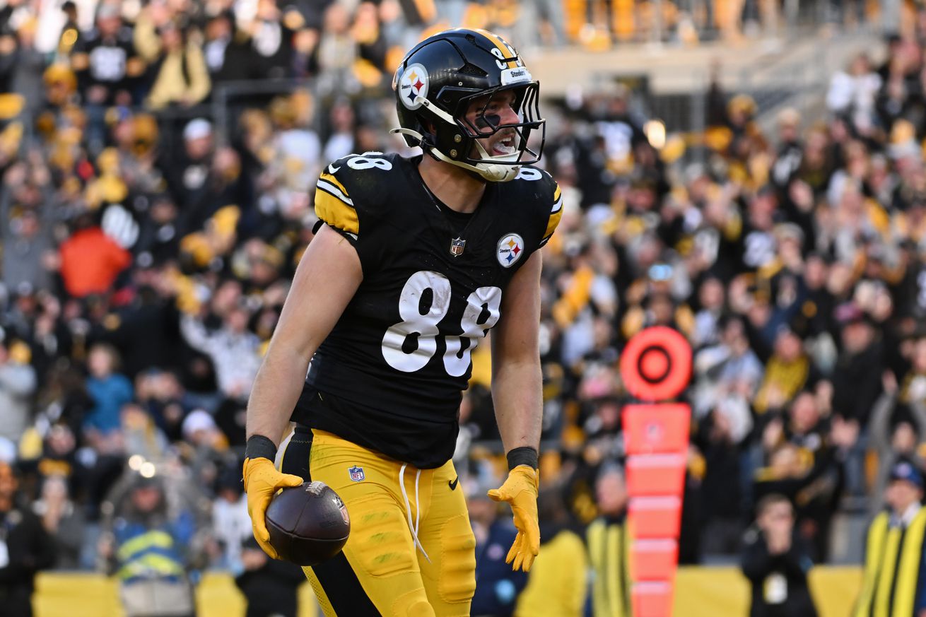 Pat Freiermuth #88 of the Pittsburgh Steelers celebrates after scoring a touchdown against the Cleveland Browns during the third quarter at Acrisure Stadium on December 08, 2024 in Pittsburgh, Pennsylvania.