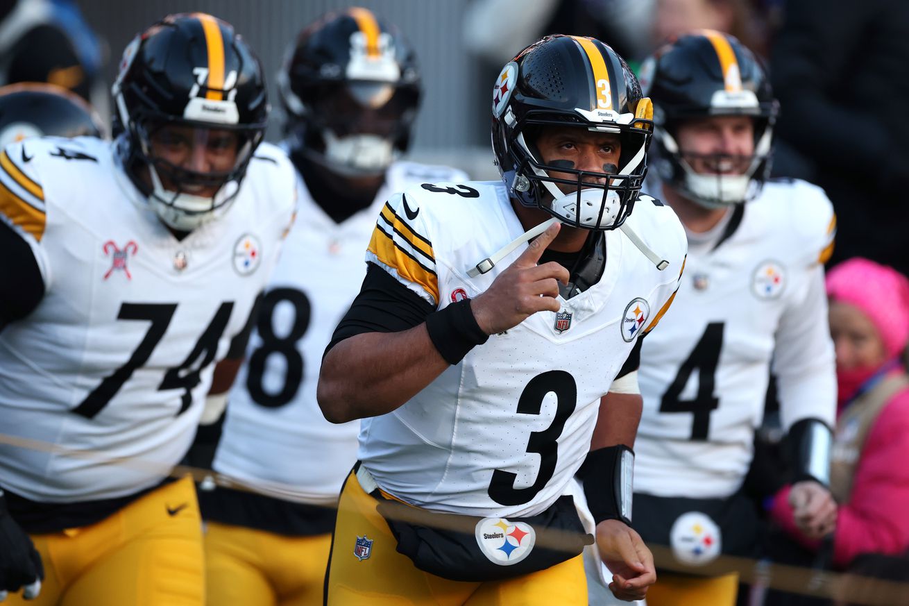 Russell Wilson #3 of the Pittsburgh Steelers takes the field ahead of Spencer Anderson #74 and Kyle Allen #4 before the game against the Baltimore Ravens at M&amp;T Bank Stadium on December 21, 2024 in Baltimore, Maryland.