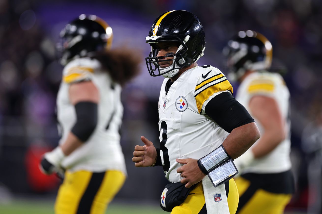 Russell Wilson #3 of the Pittsburgh Steelers runs off the field during the second quarter against the Baltimore Ravens at M&amp;T Bank Stadium on December 21, 2024 in Baltimore, Maryland.