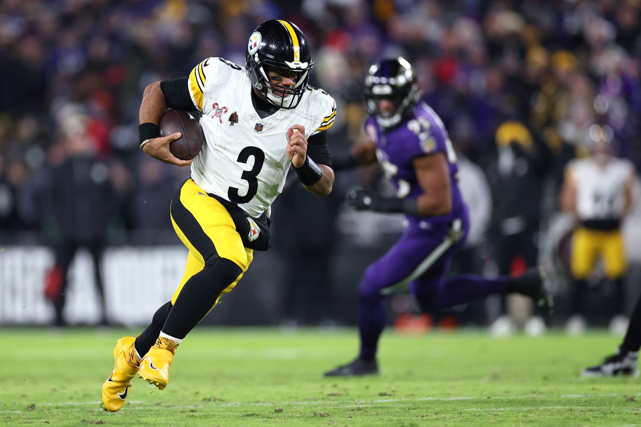 Russell Wilson #3 of the Pittsburgh Steelers runs the ball during the second quarter against the Baltimore Ravens at M&amp;T Bank Stadium on December 21, 2024 in Baltimore, Maryland.