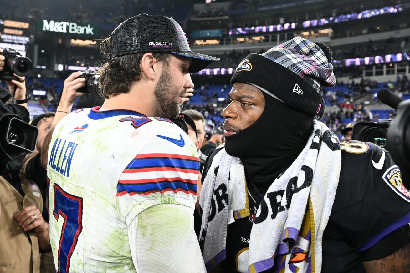 Josh Allen #17 of the Buffalo Bills and Lamar Jackson #8 of the Baltimore Ravens embrace after the game at M&amp;T Bank Stadium on September 29, 2024 in Baltimore, Maryland.