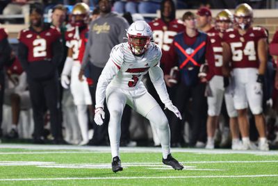 Louisville Cardinals cornerback Quincy Riley gets set during a 2024 contest against the Boston College Eagles.