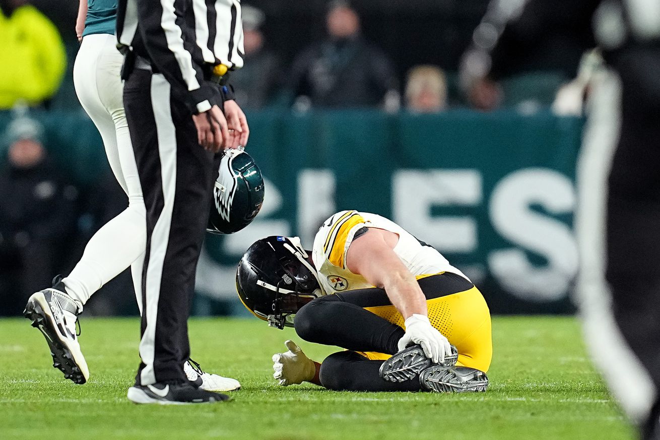 T.J. Watt #90 of the Pittsburgh Steelers reacts after an injury during the fourth quarter against the Philadelphia Eagles at Lincoln Financial Field on December 15, 2024 in Philadelphia, Pennsylvania.