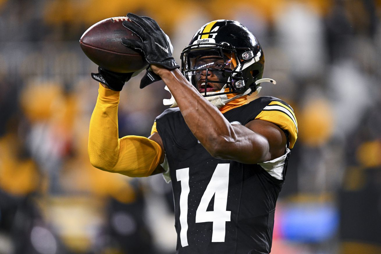 George Pickens #14 of the Pittsburgh Steelers warms up before a game against the Cincinnati Bengals at Acrisure Stadium on January 04, 2025 in Pittsburgh, Pennsylvania.