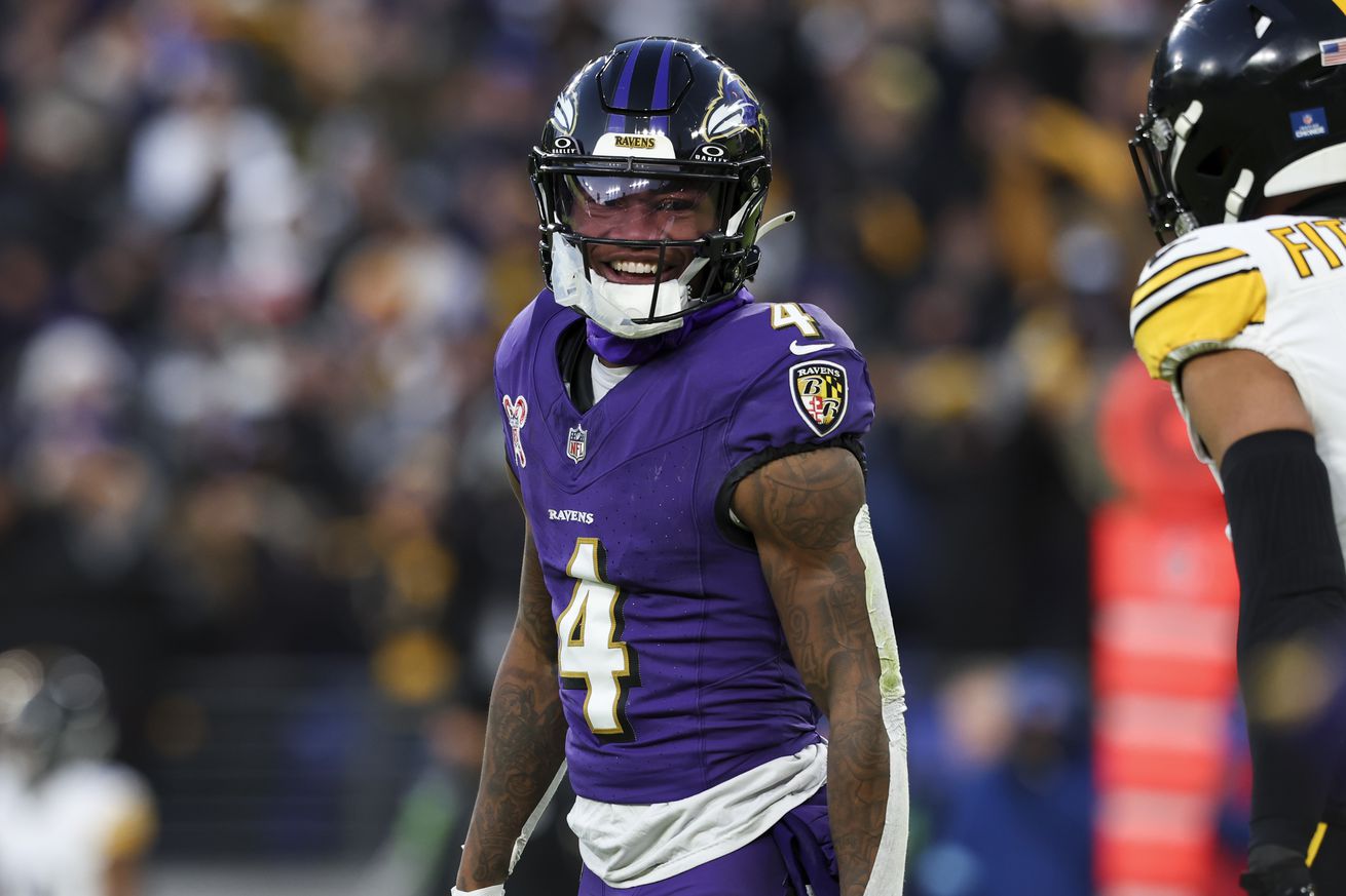 Zay Flowers #4 of the Baltimore Ravens smiles after a play during a game against the Pittsburgh Steelers at M&amp;T Bank Stadium on December 21, 2024 in Baltimore, Maryland. The Ravens defeated the Steelers 34-17.