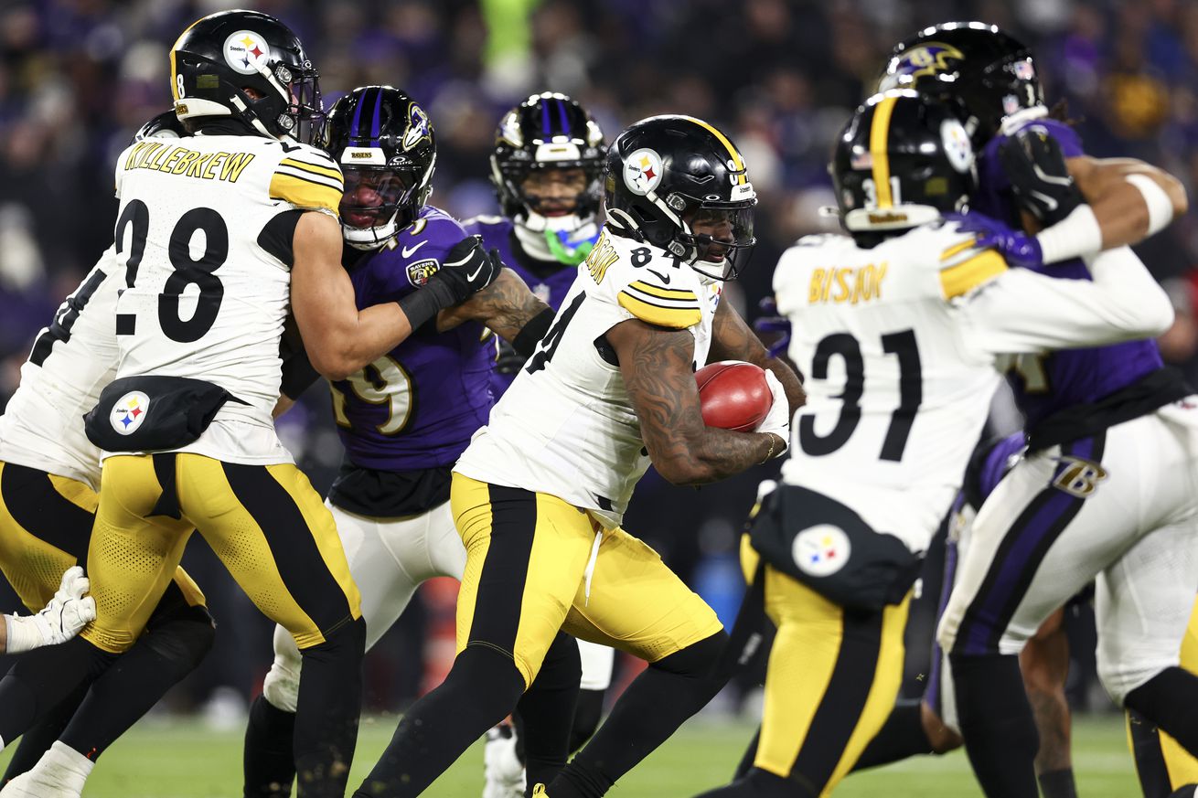 Cordarrelle Patterson #84 of the Pittsburgh Steelers carries the ball during the first half of an NFL football wild card playoff game against the Baltimore Ravens at M&amp;T Bank Stadium on January 11, 2025 in Baltimore, Maryland.