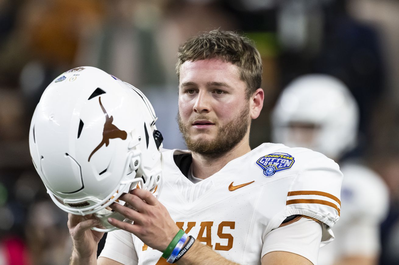 Quinn Ewers #3 of the Texas Longhorns during a game between the Ohio State Buckeyes and the Texas Longhorns at the Goodyear Cotton Bowl at AT&amp;T Stadium on January 10, 2025 in Arlington, Texas.