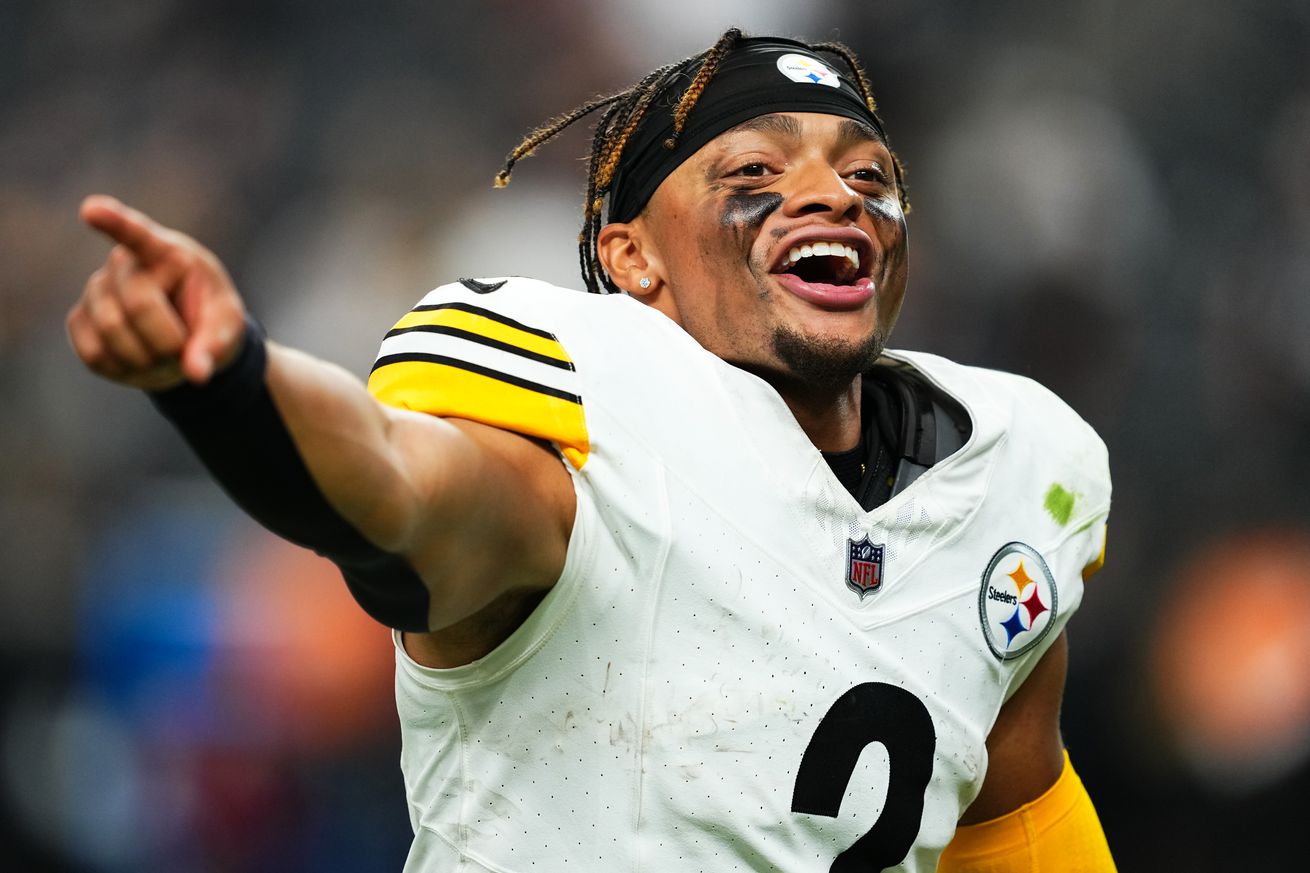 Justin Fields #2 of the Pittsburgh Steelers celebrates as he runs offthe field after the Steelers defeated the Las Vegas Raiders, 32-13, at Allegiant Stadium on October 13, 2024 in Las Vegas, Nevada.