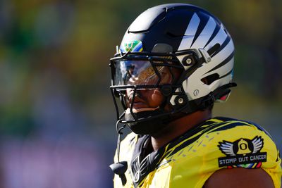 Derrick Harmon #55 of the Oregon Ducks looks on during the first half against the Illinois Fighting Illini at Autzen Stadium on October 26, 2024 in Eugene, Oregon.