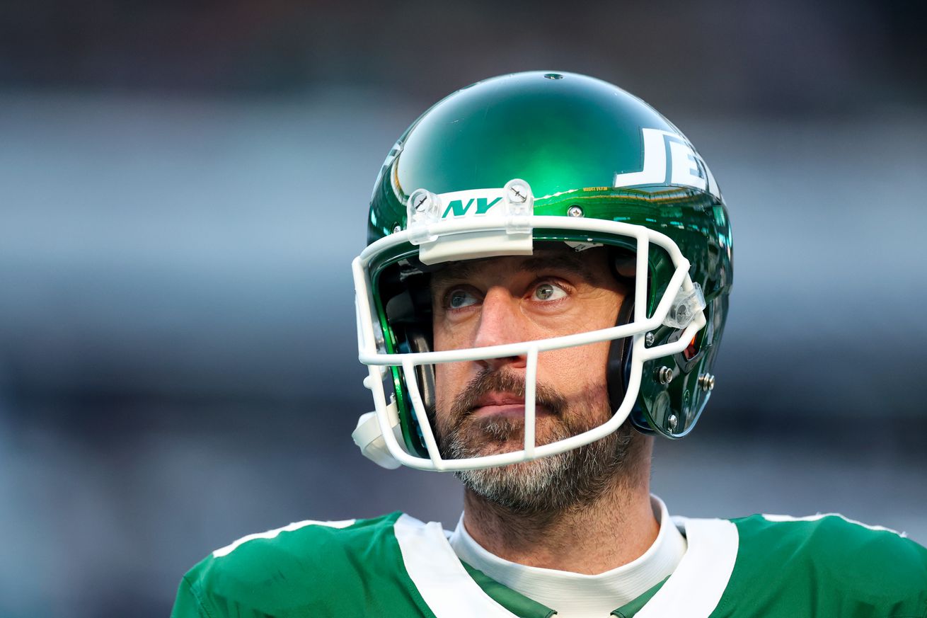 Aaron Rodgers #8 of the New York Jets looks on before the game against the Miami Dolphins at MetLife Stadium on January 05, 2025 in East Rutherford, New Jersey.