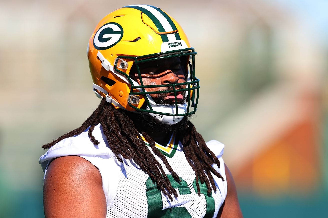 Lecitus Smith #61 of the Green Bay Packers participates in drills during the rookie minicamp at Ray Nitschke Field on May 03, 2024 in Green Bay, Wisconsin.