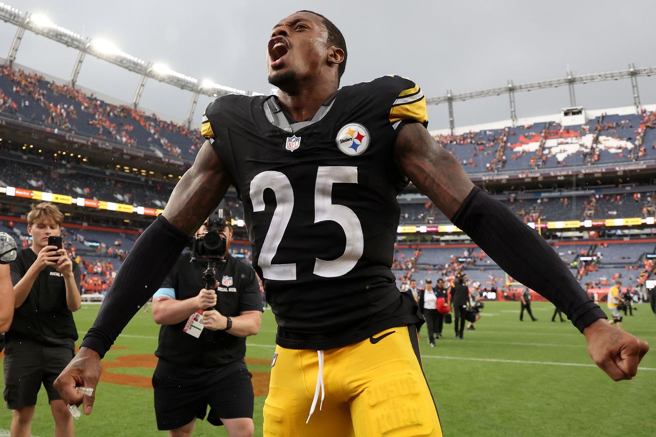 DeShon Elliott #25 of the Pittsburgh Steelers celebrates their win against the Denver Broncos in the fourth quarter at Empower Field At Mile High on September 15, 2024 in Denver, Colorado.