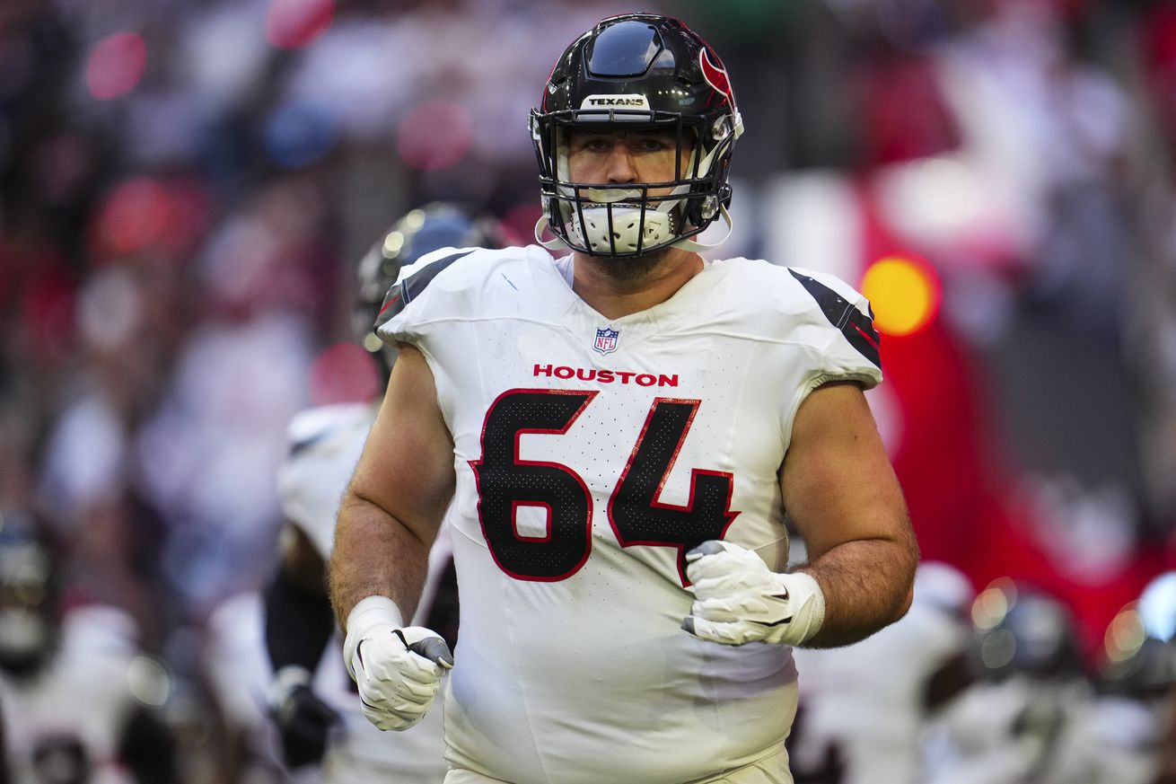 Nick Broeker #64 of the Houston Texans runs out of the tunnel prior to an NFL football game against the Chicago Bears during a football game at NRG Stadium on September 15, 2024 in Houston, Texas.