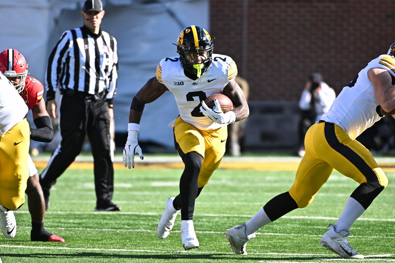 Kaleb Johnson #2 of the Iowa Hawkeyes carries the ball during the first half against the Maryland Terrapins at SECU Stadium on November 23, 2024 in College Park, Maryland.