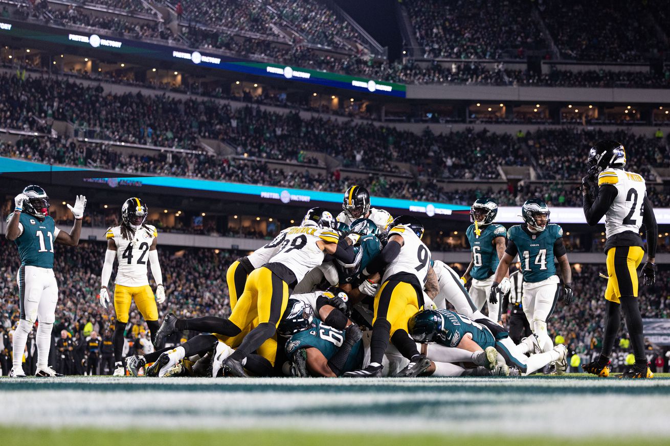 Philadelphia Eagles quarterback Jalen Hurts (1) scores on a sneak play against the Pittsburgh Steelers during the fourth quarter at Lincoln Financial Field. 