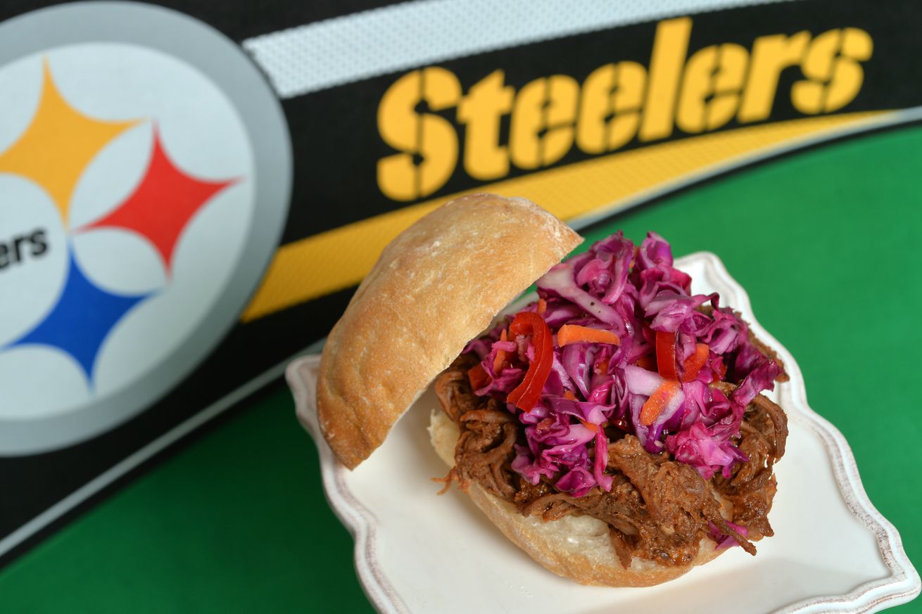 For the Tailgate section, a Pittsburgh Steelers pulled pork sandwich is photographed in Walnut Creek, Calif., on Wednesday, Oct. 21, 2015. The pulled pork with a rosy cabbage slaw hails from Pittsburgh chef Bill Fuller. (Doug Duran/Bay Area News Group)