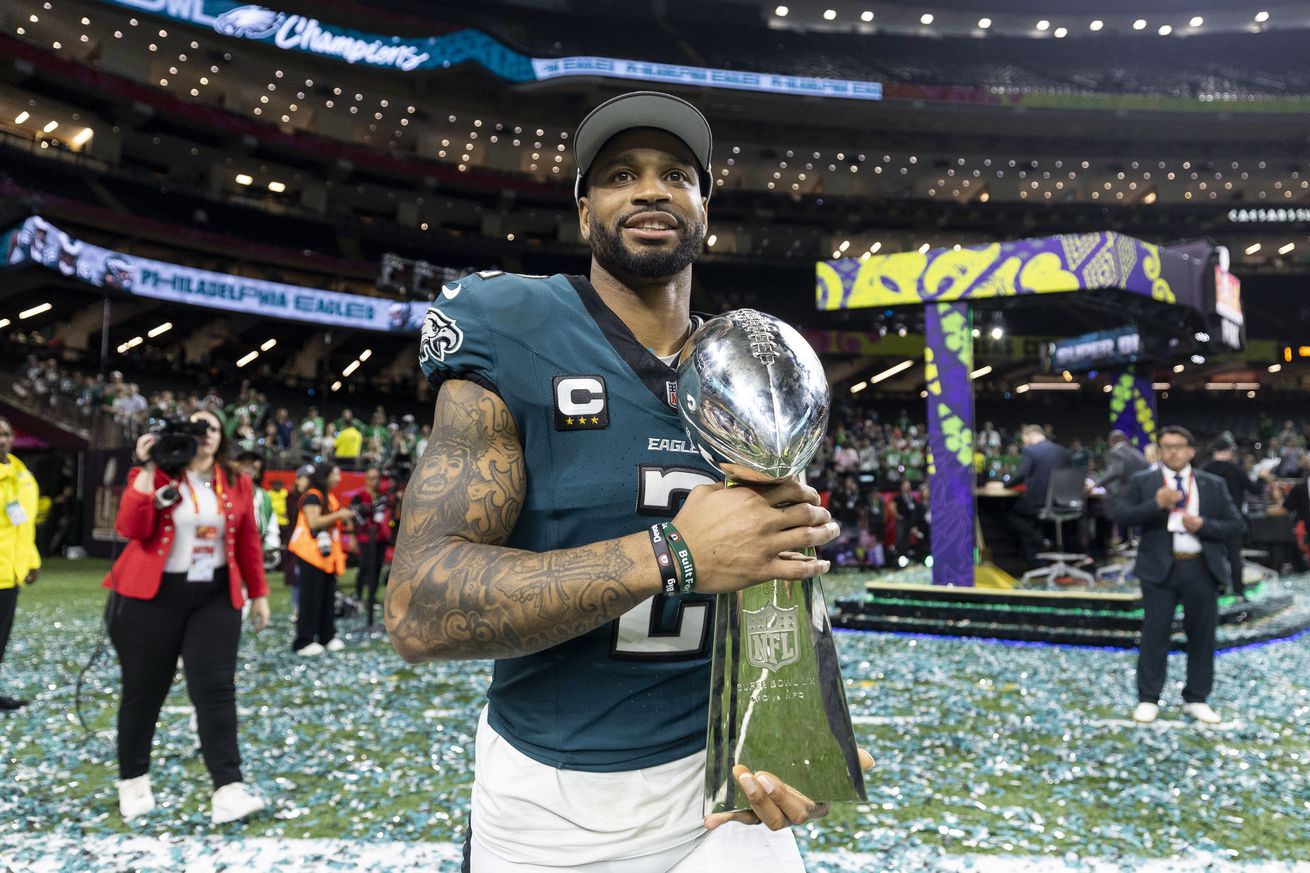 Darius Slay Jr. #2 of the Philadelphia Eagles reacts with the Vince Lombardi Trophy following Super Bowl LIX against the Kansas City Chiefs at Caesars Superdome on February 09, 2025 in New Orleans, Louisiana.